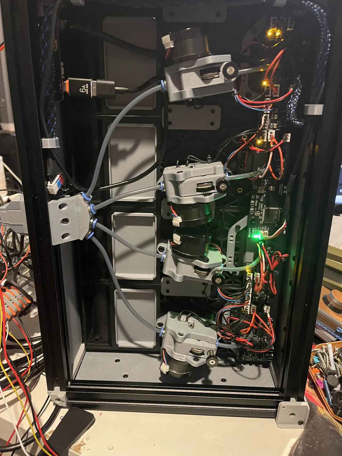 Inside the frame, the lane assemblies and their wiring are visible together.